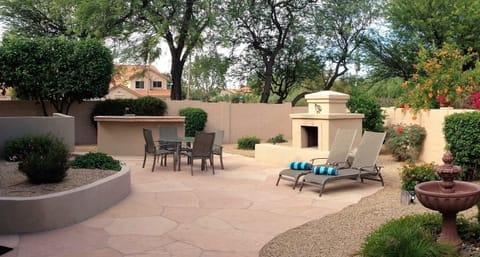 Your large private Flagstone Patio with new water feature, Kiva and built in BBQ