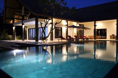 Night front view with infinity pool
