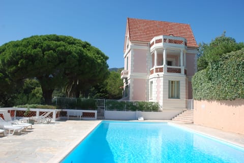 view of the house and swimming pool