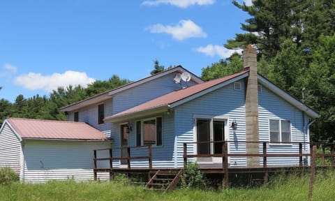 Front of house with large deck