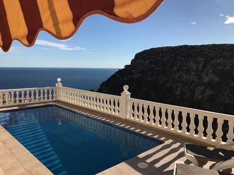 Take a dip in the heated pool - with direct sea views!