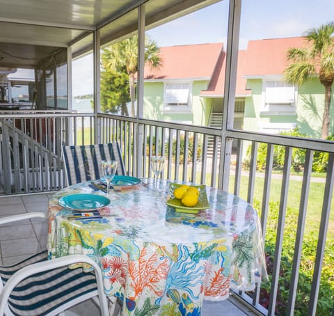 Dine on the lanai, with the beach in the background.