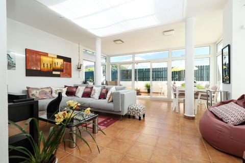 It is a  beautiful and comfortable fully glassed patio personally decoreted. 