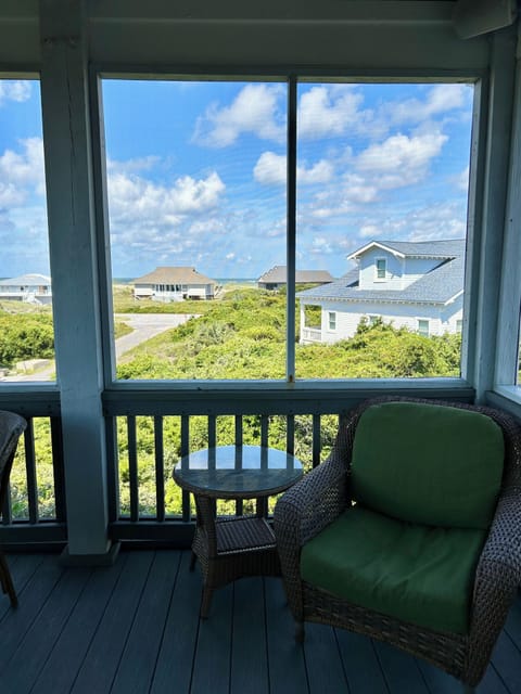 Screened porch looking to ocean - objects appear more distant than actual view