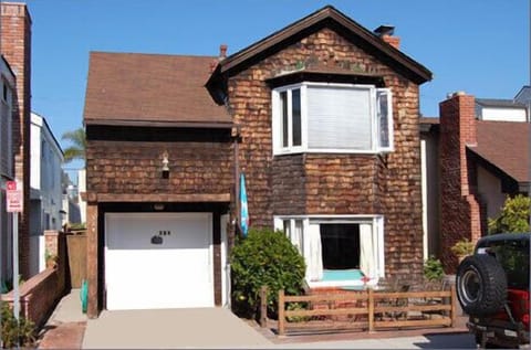 Just 3 houses from the beach and waterfront, with your own private parking space