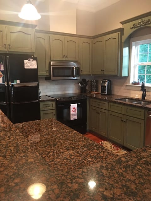 Kitchen with granite countertops and plenty of workspace