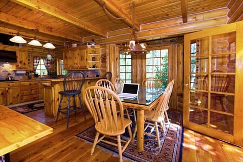 Dining room with doors to the deck