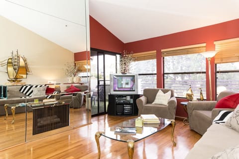 Mirror wall, gas fireplace with pushbutton lighter, wraparound patio and balcony