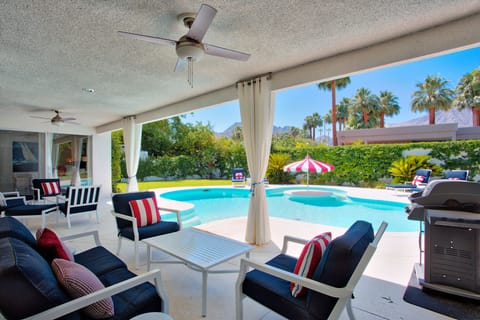 Covered patio with outside surround sound and TV and fans