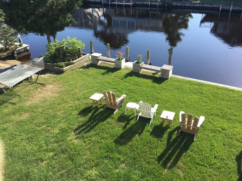 Wonderful yard with boat ramp, dock, ample seating