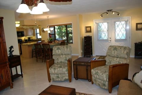 Entry way and dinning room and kitchen in the distance.