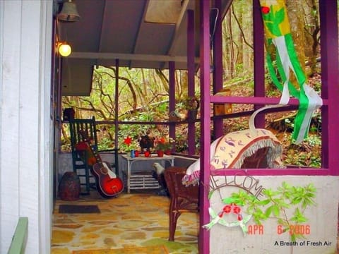 Walk up to covered porch-entry .  Enjoy rocking and or bring your guitar.