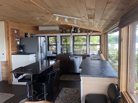 Combination of soap stone and granite tops, dishwasher, slit duct AC unit quiet