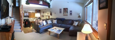 1-2014:  Most recent picture of living room, new sectional, table, lamp