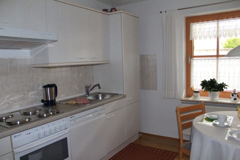 Kitchen with built-in appliances