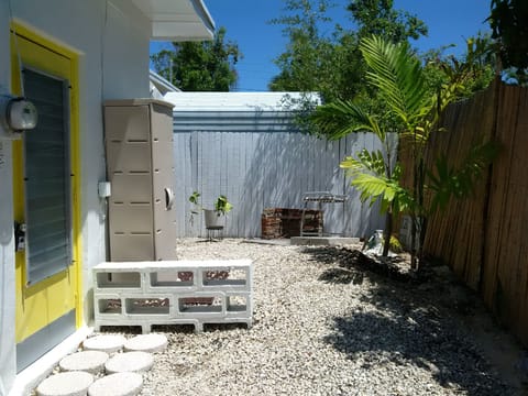 Side yard and brick bbq. 