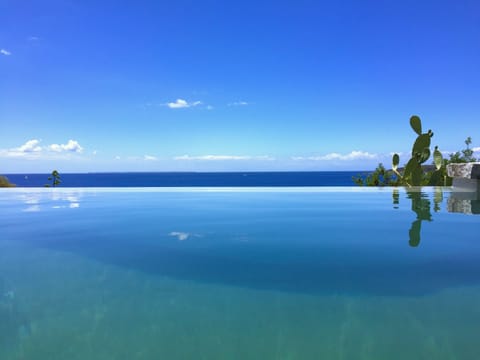 The pool with infinity edge gives the feeling to swim in the sea
