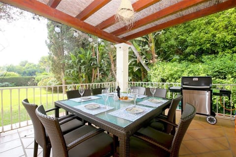 Lovely dining area for eight guests and gas barbecue available for guests on the terrace