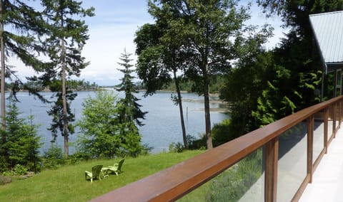 View of lawn, Winter Cove, Boat Pass and the mainland in the distance beyond BP