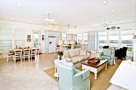 1000+ sf wrap-around porch has bay to North & wetlands to South.