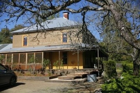 The historic Toll House with wrap around porch and many original details