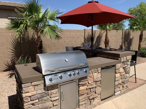 Extra large gas BBQ with Outdoor Fridge for all your cooking needs. 
