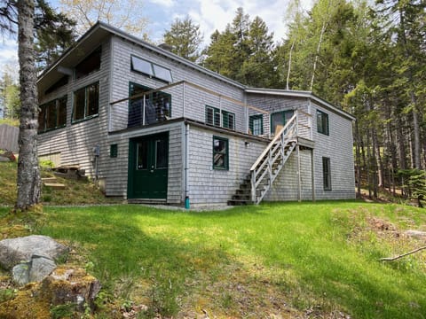 "Picea" is a spacious cottage on the shore of Bass Harbor, which is steps away.