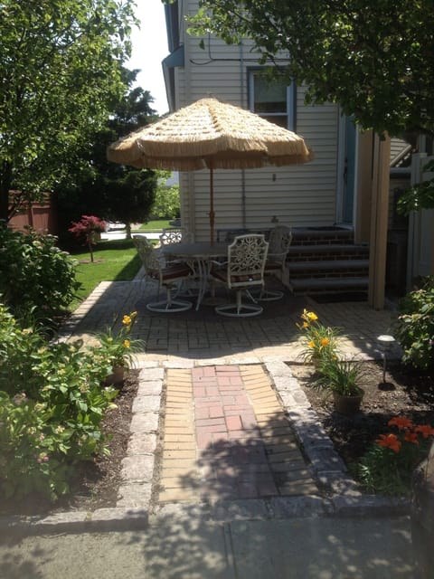 Patio and BBQ area with outdoor shower