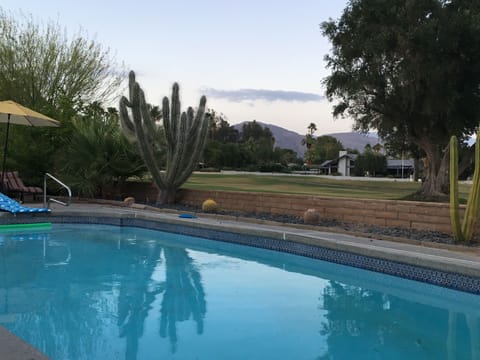 looking across the pool toward the golf course