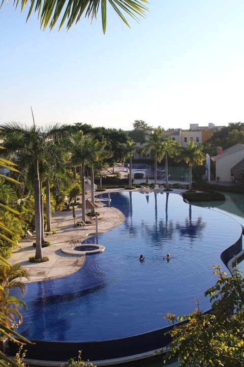One of the two beautiful pools at Condominios Taheima