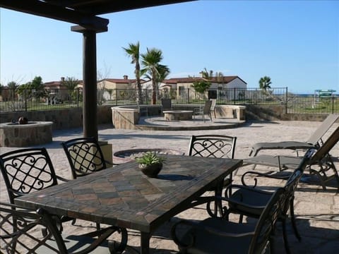 Magnificent backyard with a fire pit and sea view