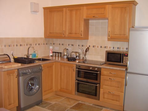 Kitchen - double oven, washer-drier, fridge-freezer


