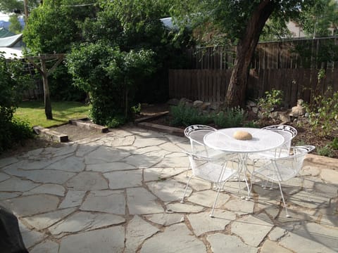 patio, plantings, gas grill available, but just out of photo.