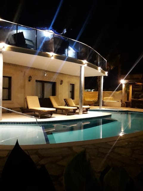 Balcony overlooking pool