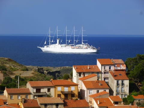 Ship at anchor behind the property (old photo)