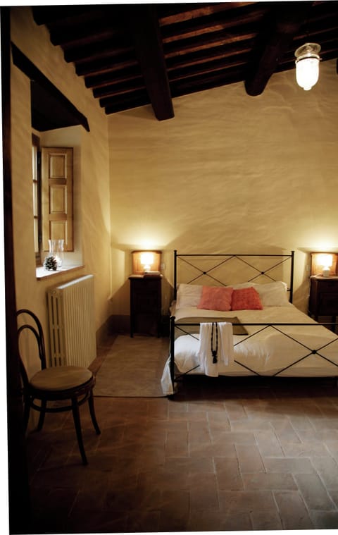 Bedroom 1 with view towards the castle. Castello di Montegiove. Leccino