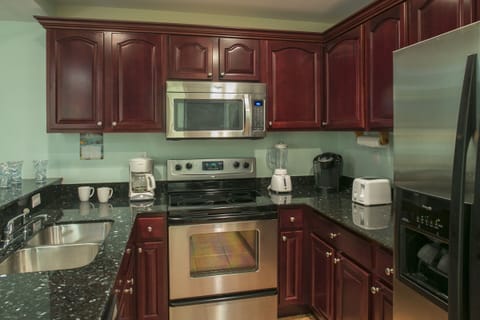 Gourmet kitchen; granite counters, dishwasher, keurig coffeemaker, refrigerator