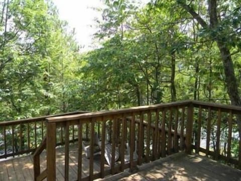 Side deck located off of master bedroom and living room.