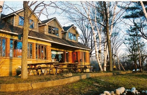 Front of House and patio as seen from top of bluff