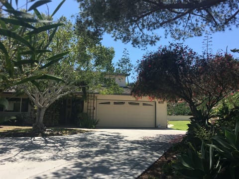 Welcoming privacy awaits at the top of the 120 ft long drive.