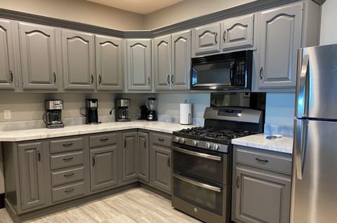 Remodeled kitchen is is fully equipped to keep the chefs smiling.