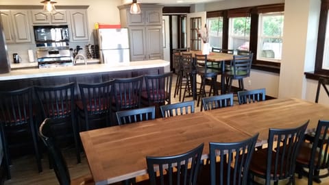 DR & KI have scenic views for taking in Stone Lake while dining. Seating for 30.