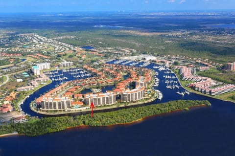 Burnt Store Marina & Country Club view to east - arrow indicates condo location