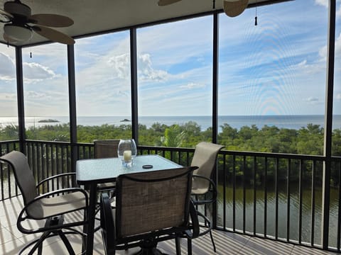 Panoramic Gulf of America waterfront living from your spacious tiled lanai