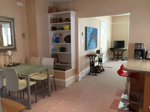 The Parlour Suite occupies the entire main level of a 1914 Edwardian Manse. 