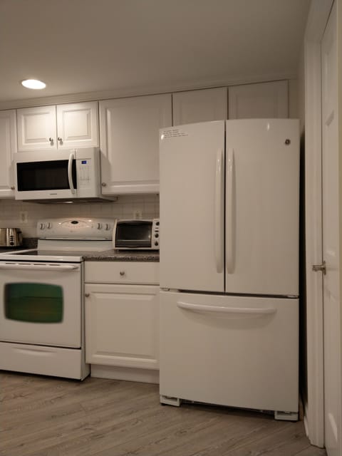 French Door Refrigerator in Open kitchen with direct ocean view.