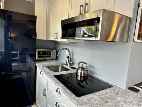 Induction Wolf Cooktop, Breville Smart Oven and Whirlpool Microwave