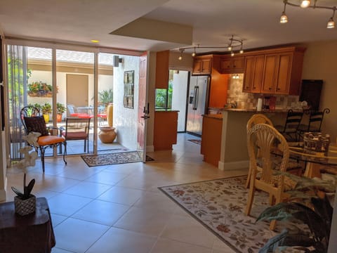 The entryway opens to a large foyer with easy access to the kitchen and dinette.