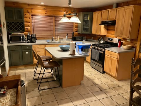 Kitchen has ample space for cooks, very well-equipped by rental standards