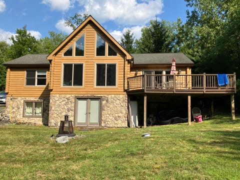 Large yard and wraparound deck for outdoor fun
